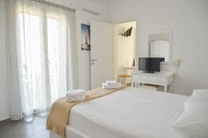 Posteľ alebo postele v izbe v ubytovaní Zeras Apartments