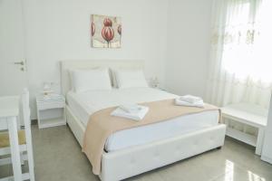 Posteľ alebo postele v izbe v ubytovaní Zeras Apartments