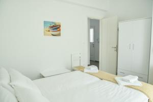 Posteľ alebo postele v izbe v ubytovaní Zeras Apartments