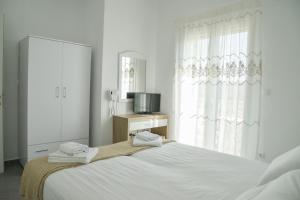 Posteľ alebo postele v izbe v ubytovaní Zeras Apartments