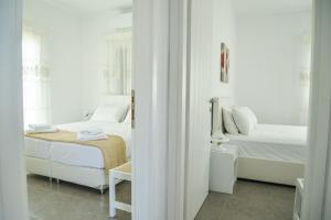 Posteľ alebo postele v izbe v ubytovaní Zeras Apartments
