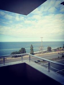 a view of the ocean from the balcony of a building at Trabzon Meydan in Trabzon