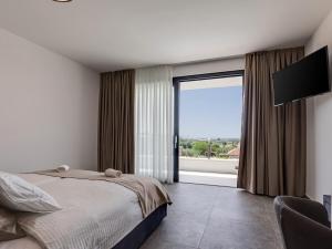 Ένα ή περισσότερα κρεβάτια σε δωμάτιο στο Villa Riposo 2 by SeeAdria Agency +57 φωτογραφίες