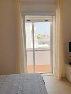 Postel nebo postele na pokoji v ubytování Acquazzura Salento Torre Mozza