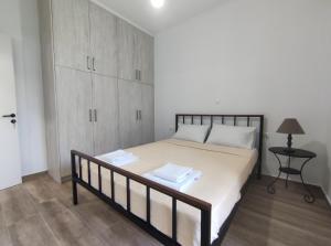Posteľ alebo postele v izbe v ubytovaní Aeraki House