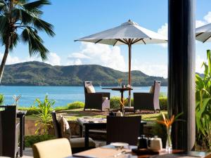 A restaurant or other place to eat at Raffles Seychelles