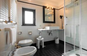 Koupelna v ubytování Sardegna Hotel - Suites & Restaurant