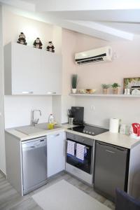 Köök või kööginurk majutusasutuses Apartmani Dijana 2