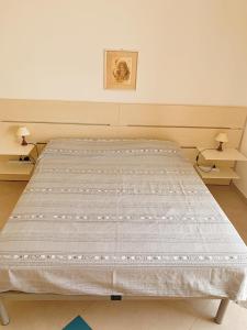 Postel nebo postele na pokoji v ubytování Acquazzura Salento Torre Mozza