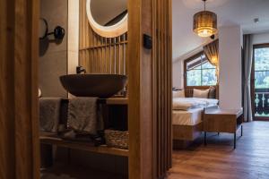 Voodi või voodid majutusasutuse Bergrose Hideaway toas