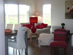 Posezení v ubytování Gîte Les Vignes