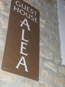 a sign that reads guest house a lease at Guest House Alea in Ulcinj