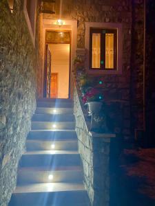 a set of stairs leading up to a house at Guest House Alea in Ulcinj