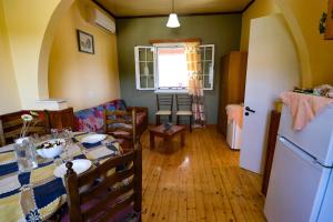 Kuchyň nebo kuchyňský kout v ubytování Antigone Apartments