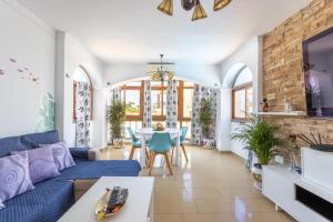 Et opholdsområde på Apartamento con piscina privada