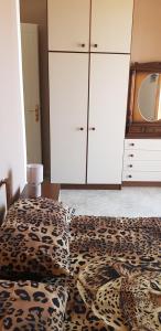 A bed or beds in a room at Vacanze in Sicilia