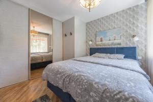 En eller flere senge i et værelse på Taikos hill apartament