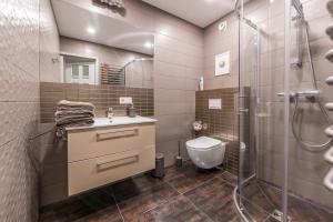 Et badeværelse på Taikos hill apartament + 16 billeder