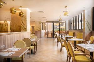 Ein Restaurant oder anderes Speiselokal in der Unterkunft Rhactus Hotel, New Alamein 