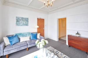 a living room with a couch and a table at Host & Stay - The Gallery Apartments in Scarborough