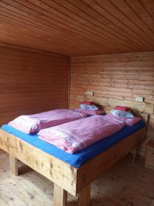 Postel nebo postele na pokoji v ubytování chata FRIDAY