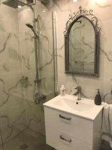 Kúpeľňa v ubytovaní Apartament Chanel Centrum