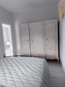 Posteľ alebo postele v izbe v ubytovaní Vintage Beach House