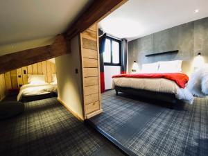 Postel nebo postele na pokoji v ubytování Hôtel 16 | 150 Montagne & Spa Nuxe