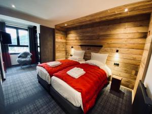 Postel nebo postele na pokoji v ubytování Hôtel 16 | 150 Montagne & Spa Nuxe