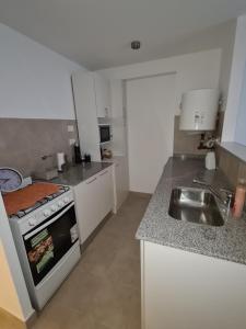 Η κουζίνα ή μικρή κουζίνα στο DOS ANGELES +1 φωτογραφίες