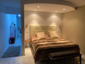 a bedroom with a large bed in a room at Studio Apartment Ocean View in Portimão +7 photos