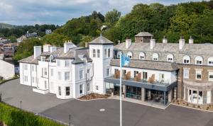 an aerial view of a large white building at The Ro Hotel Windermere in Bowness-on-Windermere