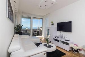 Posedenie v ubytovaní Deluxe apartment Beni Makarska, 4 person SEA VIEW