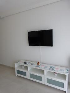 Televízia a/alebo spoločenská miestnosť v ubytovaní Apartment NoStress