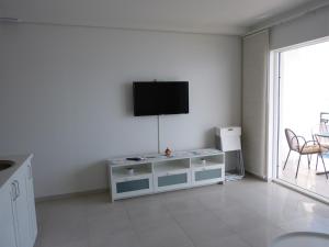 Televízia a/alebo spoločenská miestnosť v ubytovaní Apartment NoStress