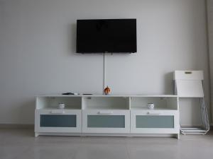 Televízia a/alebo spoločenská miestnosť v ubytovaní Apartment NoStress
