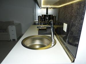 Kuchyňa alebo kuchynka v ubytovaní Apartment NoStress + 37 fotografií