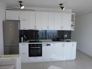 Kuchyňa alebo kuchynka v ubytovaní Apartment NoStress