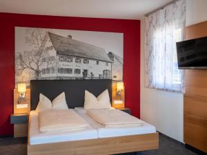 Postel nebo postele na pokoji v ubytování Hotel Gasthaus Krone