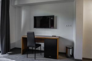 TV a/nebo společenská místnost v ubytování Apartmány Sport & Ski