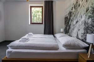 Postel nebo postele na pokoji v ubytování Apartmány Sport & Ski