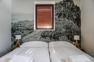 Postel nebo postele na pokoji v ubytování Apartmány Sport & Ski