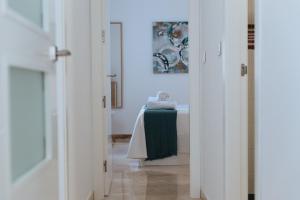 Posteľ alebo postele v izbe v ubytovaní Triana Home - Free Parking