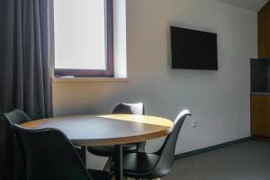 TV a/nebo společenská místnost v ubytování Apartmány Sport & Ski