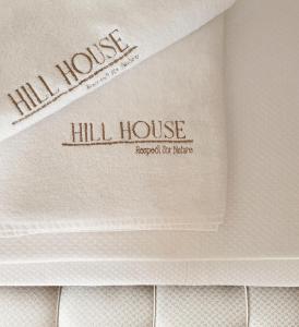 a book with the words hill house arranged for music at Hill House Adult Only in Kaş