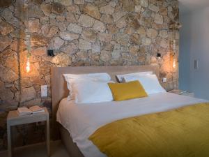 Postel nebo postele na pokoji v ubytování Hotel A Piattatella