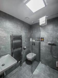 Koupelna v ubytování Apartmány Sport & Ski