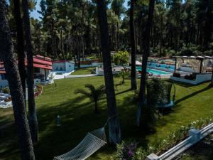 Afbeelding uit fotogalerij van Forest Sani Villa in Sani Beach