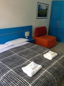 A bed or beds in a room at Colombo Centrale