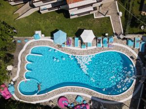 an overhead view of a swimming pool at a resort at Macedon in Limenas